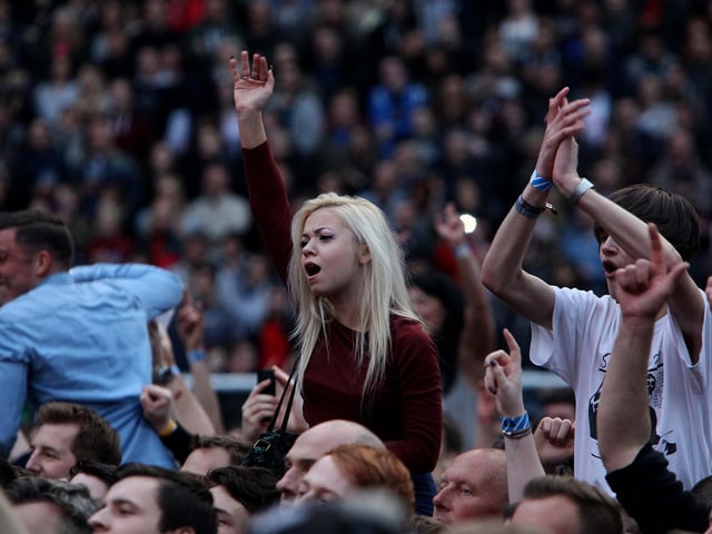 Fans salute their heroes.