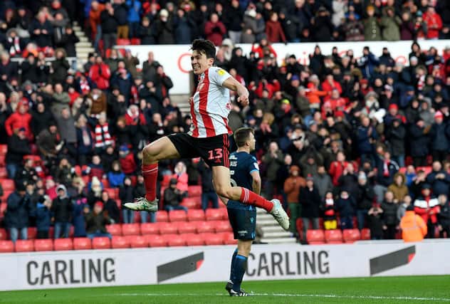 Luke O'Nien celebrates a Sunderland goal.