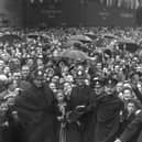 Sunderland people enjoying their VE Day holiday with smiles and cheers for Victory in 1945.