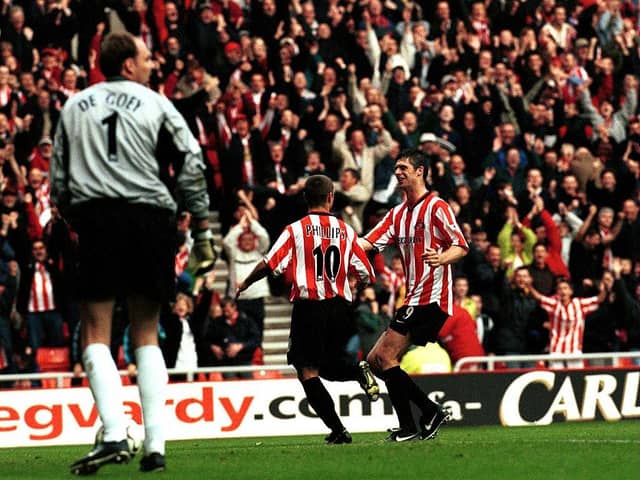 Kevin Phillips is congratulated by team mate Niall Quinn during the FA Carling Premiership match between Sunderland and Chelsea played at the Stadium of Light.
