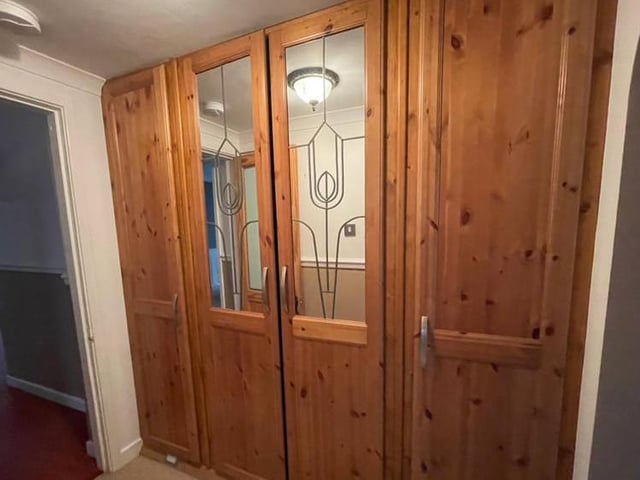 Let's take a closer look at the built-in, full-height wardrobes that adorn the master bedroom at the front of the house.