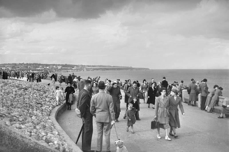 August Bank Holiday makers at Seaburn - but the bad weather meant it was a day for overcoats.