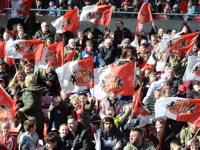 Sunderland supporters watch the first team players open training session at the Stadium of Light.