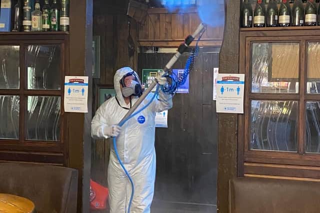 Deep cleaning at The Cavalier pub before it reopened to the public.