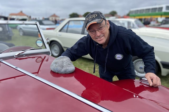John Cooper shines his car  Vintage car and bus rally, held at Seaburn Recreational Ground.