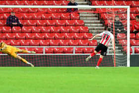 Bradford City goalkeeper Sam Hornsby makes a penalty save