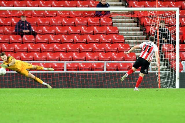 Bradford City goalkeeper Sam Hornsby makes a penalty save