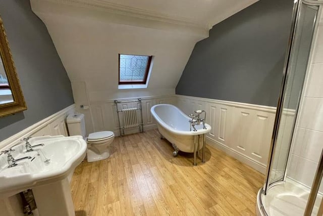 One of the highlights of the Riddings house is this beautiful Victorian-style family bathroom. It's a four-piece suite comprising a slipper-style bath, corner shower enclosure, low-flush WC and pedestal wash hand basin. Notable features are a Velux-style window and an Edwardian-style radiator.