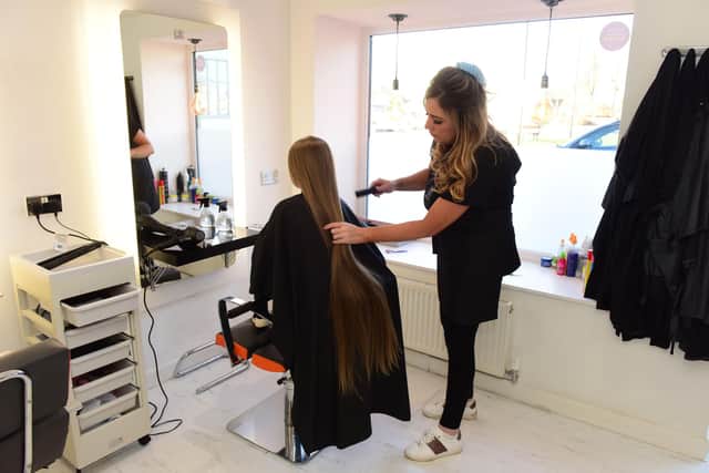 Ella's hair was 43 inches long and is being donated to the Little Princess Trust.