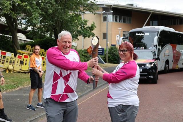 Keith Weavers from Tanfield Lea takes the first baton run before passing it on to Tracy Greenhalgh.