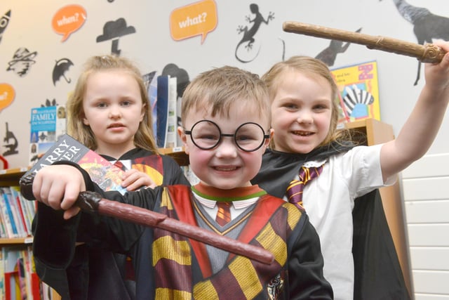 Ryhope Infant School pupils Leila Wisbeck, 7, Francis Dodsworth, 5 and Anna Irving-Mitchinson, 5, dressed as Harry Potter and Hermione Granger.