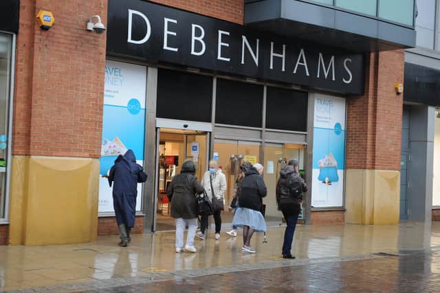 Shoppers visiting Debenhams for the final time.