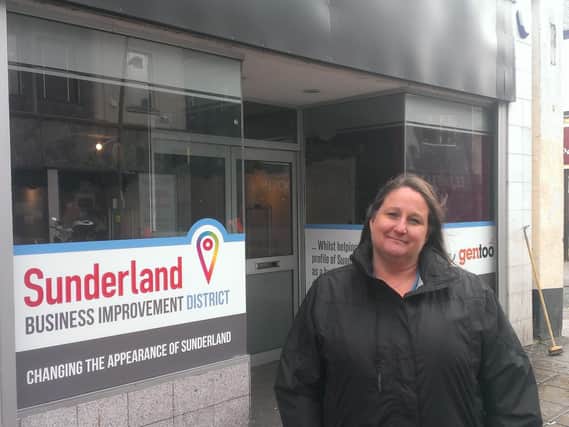 Kirsty Currie, Sunderland bid executive assistant, outside the empty Game store in High Street West