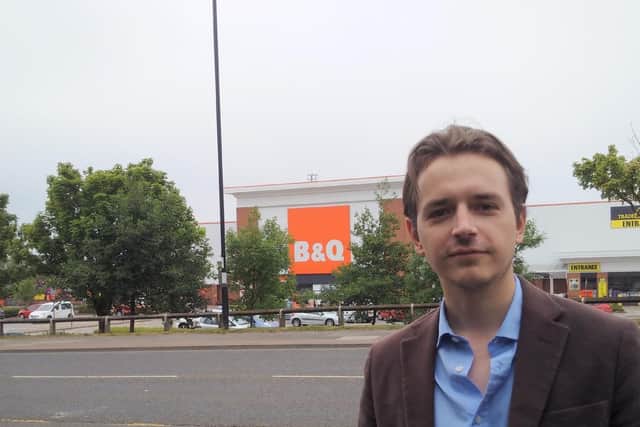 Councillor Niall Hodson outside the B&Q store in Trimdon Street.