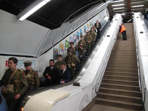Actors dressed as soldiers mark the 100th anniversary of the Battle of the Somme on the Tyne and Wear Metro.