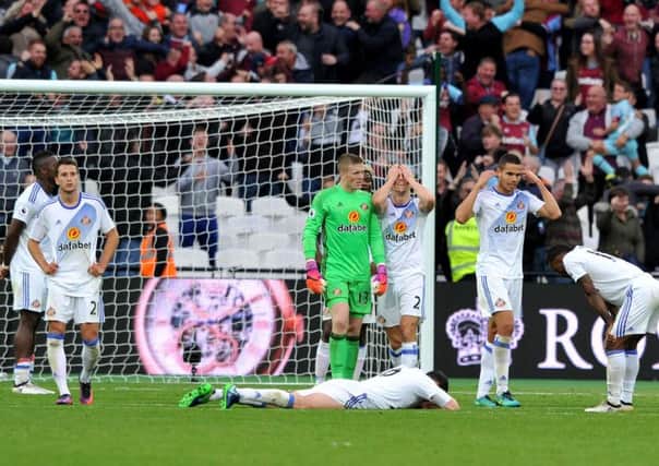 Sunderland's players can't believe they have conceded a last-gasp winner. Picture by FRANK REID