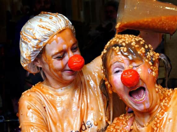Angela Cornell and Mary Jones, right, took to a bath of baked beans to raise money for Comic Relief at the Grangewood Care Centre, in Shiney Row, in 2011.
