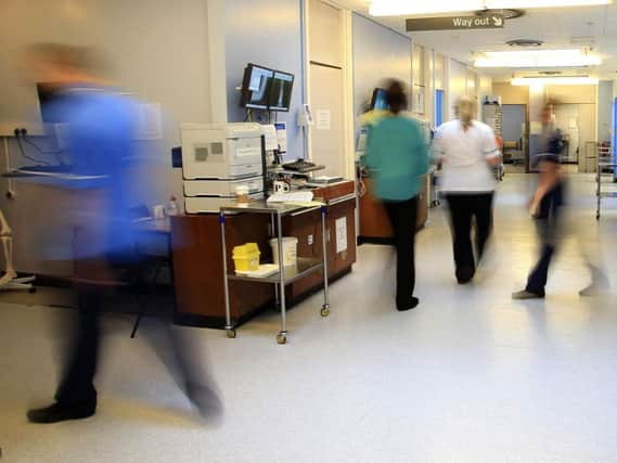 Nurses are starting to vote on whether they want to take industrial action in protest at a continuing cap on their pay. Picture: PA.