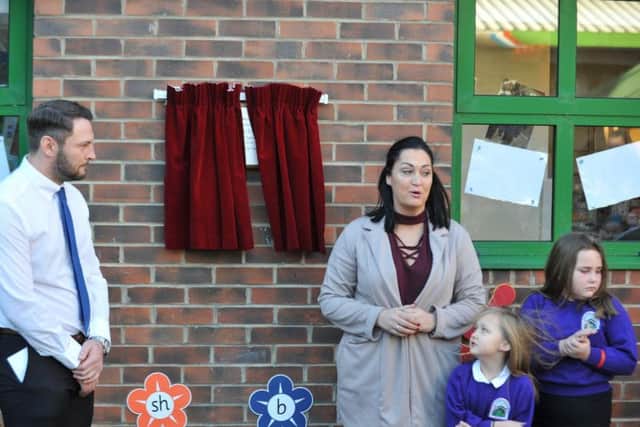 Gemma Lowery unveils plaque in memory of her son Bradley along with John Steel who came up with the idea.
