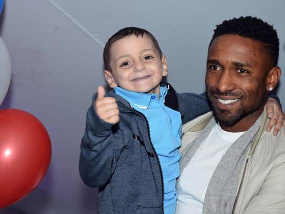Bradley with Jermain Defoe at his sixth birthday party, held in May 2017.
