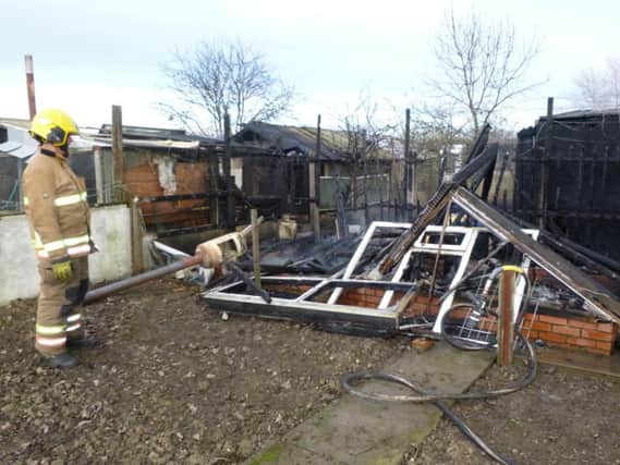Twenty chickens died in the fire. Pic: TWFRS