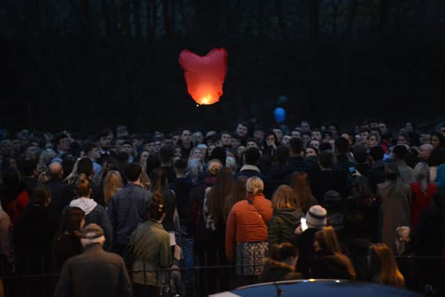 The crowds pay their respects to a much-loved young man.