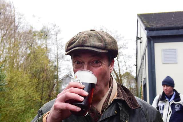 MEP Nigel Farage enjoying a pint at the end of Saturday's March to Leave at the Merry Go Round pub, Hartlepool.