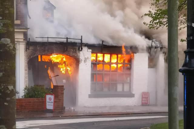 Fire rages through the building. Picture: Jason Vasey.
