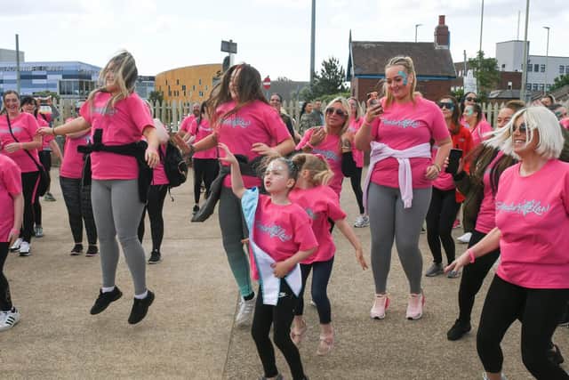 Walkers warming up ahead of the sponsored walk for charity Amber's Law.