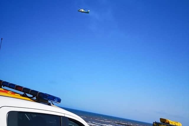 The air ambulance was called after a man fell from the cliffs in Whitburn