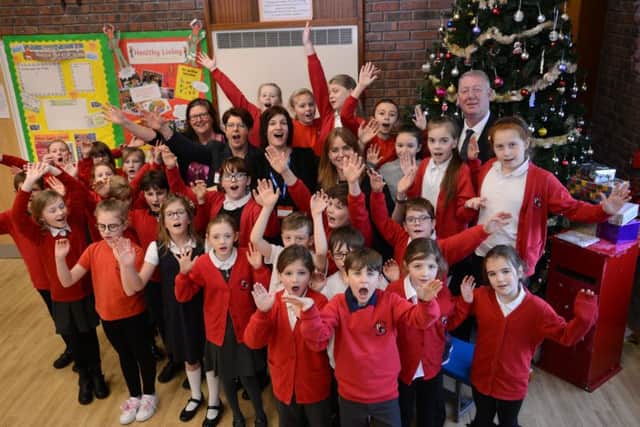 Rickleton Primary School pupils pictured last year, rehearsing for the big sing, with Coun John Kelly joining them.