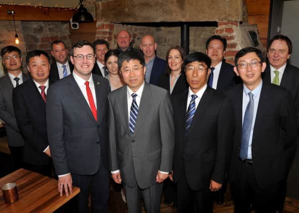 At Washington old Hall, Deputy Leader of Sunderland City Council Councillor Michael Mordey (front left) with the Harbin delegation and senior council officers.