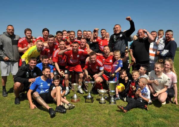 Southwick celebrate last week's season-ending victory in the Total Sport Challenge Cup final against RCA Grangetown Florists.