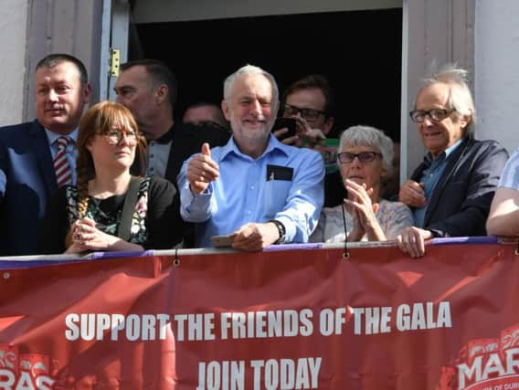 Labour Party leader Jeremy Corbyn on the Royal County Hotel balcony watching the 2017 Durham Miners' Gala.
