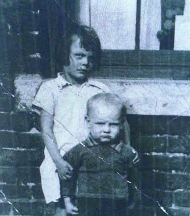 Edith's daughter Margaret - who died of a rare blood disorder - with Edith's son Patrick. The photo was taken in the 1930s.