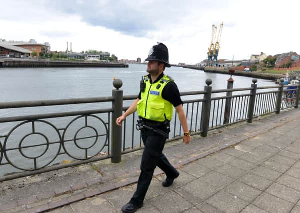Pc Dan McGwinn carries out a patrol of the River Wear's banks ahead of next month's Tall Ships Races in the city.