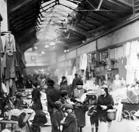 Back to 1930 for this archive photo of  the old market at the foot of High Street East.