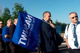 John Hall, national executive member for NASUWT, (left) with striking teachers outside Washington Academy.