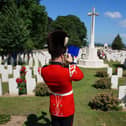 A bugler from the Band of the Queens Division at the ceremony.