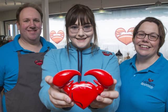 Sophie Gray with Latimer's owners Robert and Ailsa Latimer