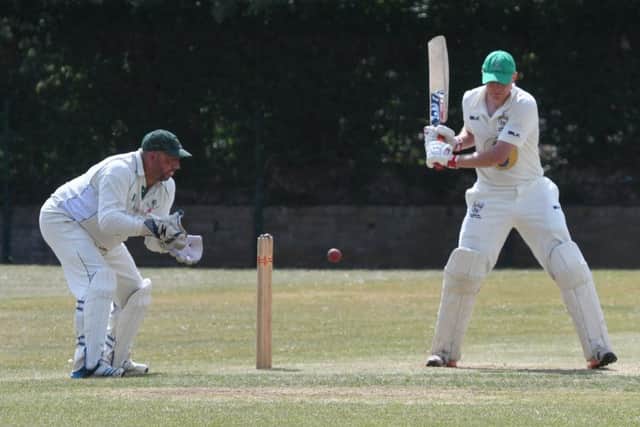 Burnmoor batsman Kevin Dixon leaves a ball as Boldon wicketkeeper Geoff Sargon gets ready to gather. Picture by Kevin Brady