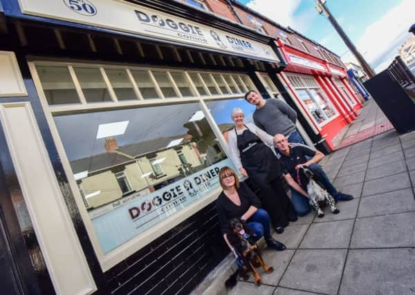 Doggie Diner cafe in Middle Street, Blackhall is holding a sponsored dip. (L-R) Adrienne Dickson franchise owner with Pippin and David (with Buster) Craig and Sue Nelson.