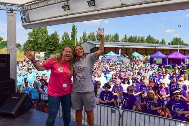 Cancer Research UK fundraising manager Cancer Research Rachel Speight-McGregor, left, with event organiser Ann Walsh and hundreds of participants and supporters.