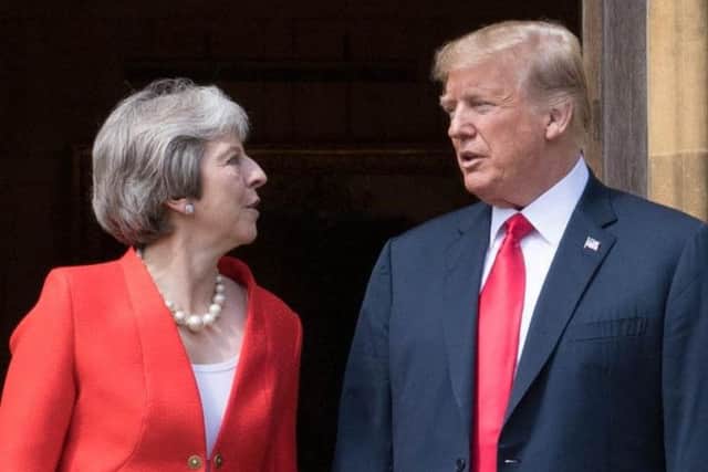 Prime Minister Theresa May says US President Donald Trump advised her to 'sue the EU' over Brexit. Pic: Stefan Rousseau/PA Wire.