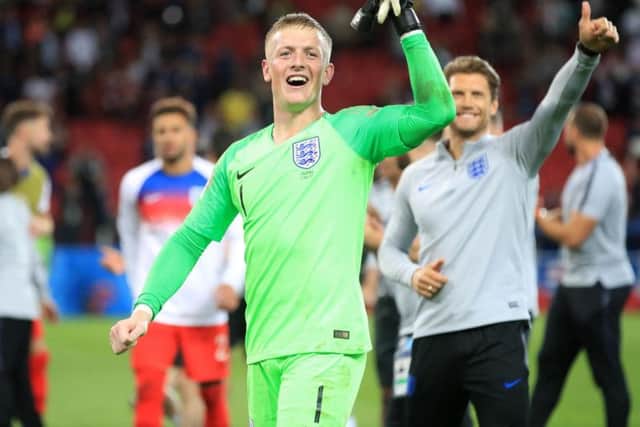 Jordan Pickford celebrates England's round of 16 win over Colombia at this year's World Cup. Pic by PA.