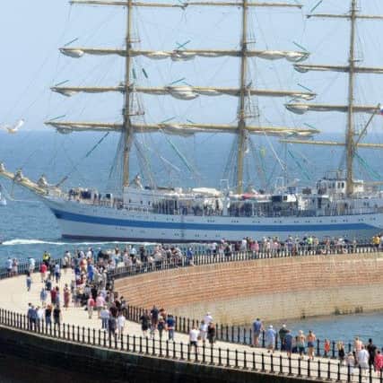 The Mir leads the ships out of port at the end of Tall Ships Sunderland.