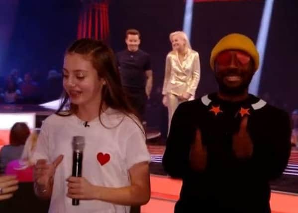 Jessie Dale with Will.i.am - who decorated his face with hearts to show his delight in her performance - and fellow The Voice Kids judges Danny Jones and Pixie Lott in a still from the ITV show.