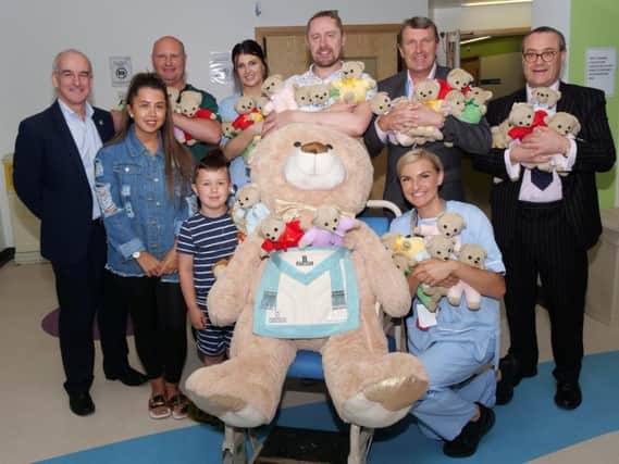 Freemasons from the Province of Durham were at Sunderland Royal Hospital as the 12,000th TLC teddy is handed over.
