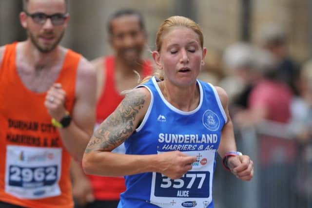 Alice Smith comes home as the third woman in last night's Durham City 10k run.