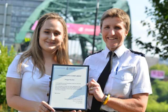 Paige Hunter receives a commendation by Chief Superintendent Sarah Pitt in recognition of comfort notes left on Wearmouth Bridge